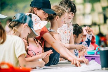 Kids painting outside