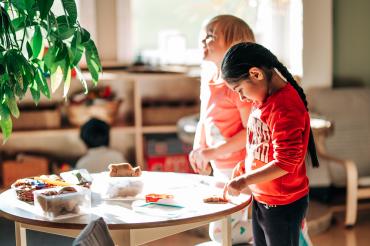 Children playing at a table