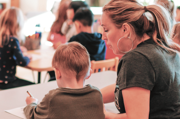 early reader with teacher