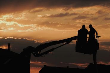 Workmen on machinery