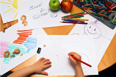 child drawing back to school