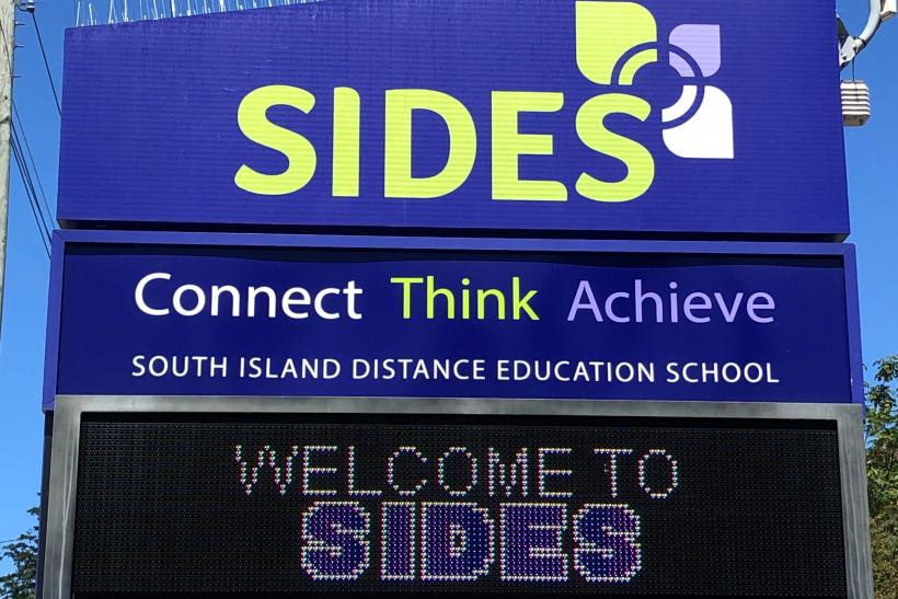 SIDES school sign