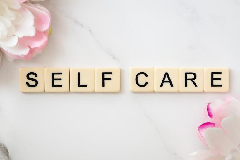 self care spelt with scrabble tiles