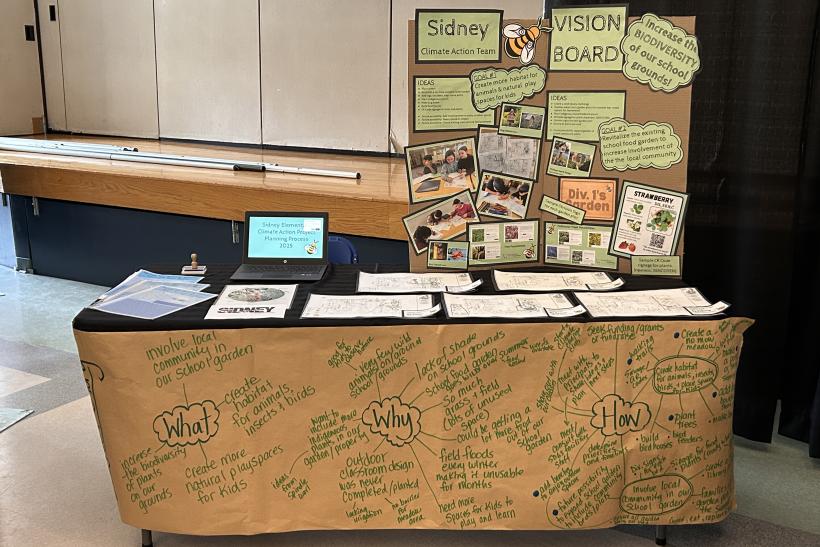 table with pictures and leaflets