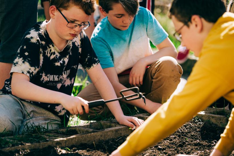 students working in garden