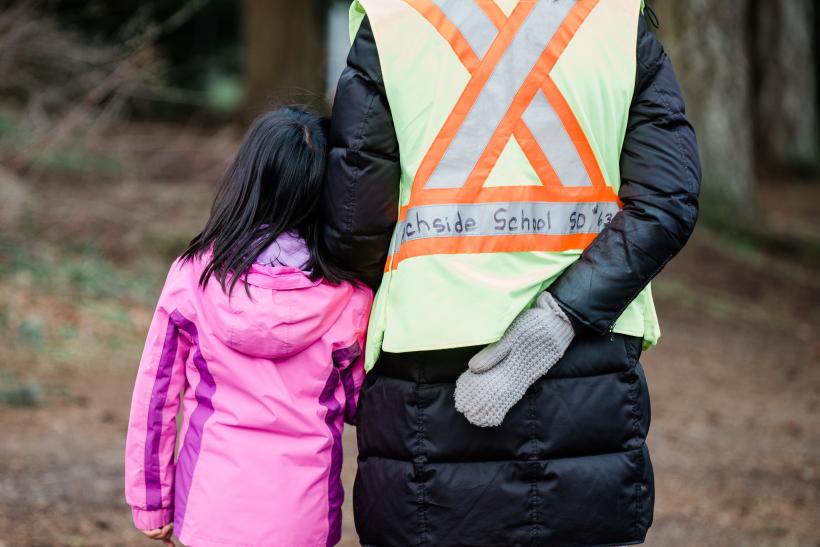 school aide with child
