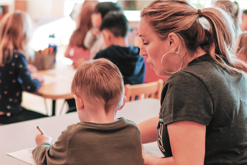 early reader with teacher